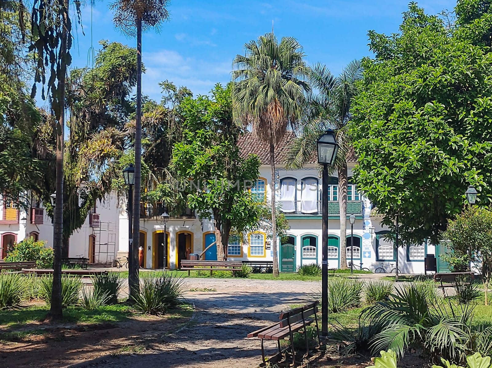 Paraty, Rio de Janeiro, Brazil, February 6, 2025, view of the square with lots of vegetation, historic city with colonial mansions in the background.