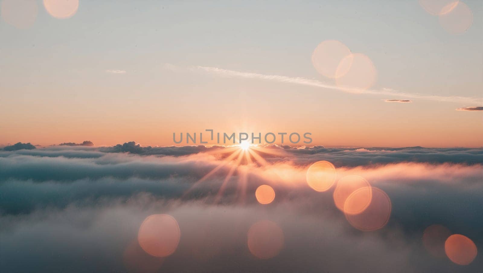 A stunning sunset over the clouds, bathed in warm golden hues. This breathtaking scene is perfect for travel, tourism, and nature-themed projects, evoking feelings of peace and tranquility.