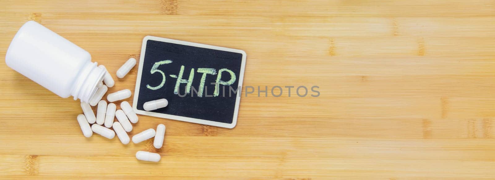 5-HTP sleep supplement capsules. Selective Focus. night.