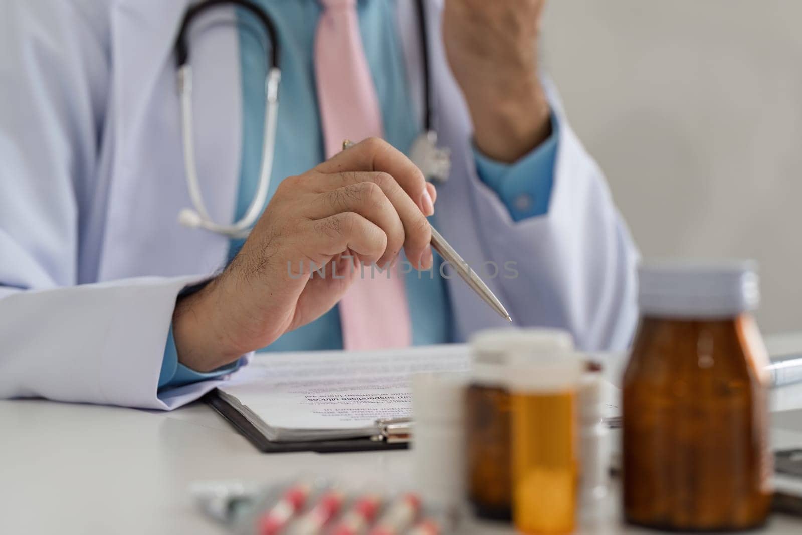 The physician evaluates medication options and their implications on patient health, reinforcing the role of analytics in modern healthcare.