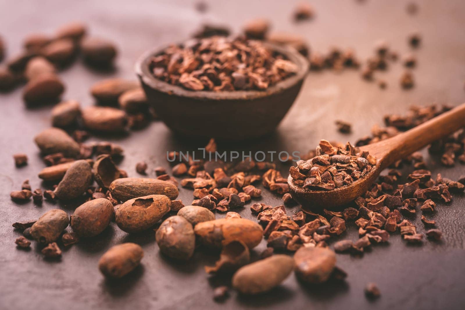 Organic cacao beans and nibs in small bowl