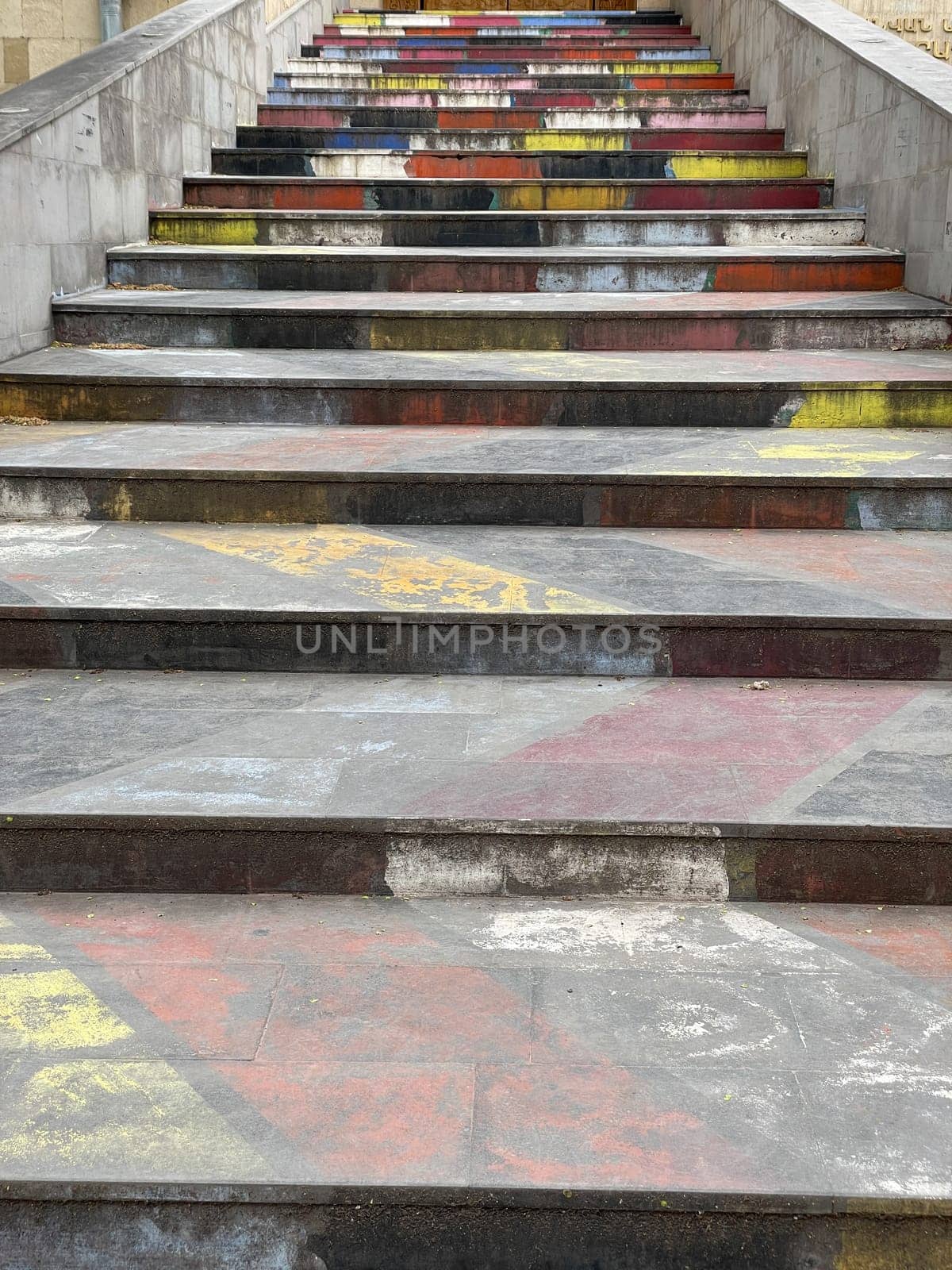 colored steps of the stone staircase to the top