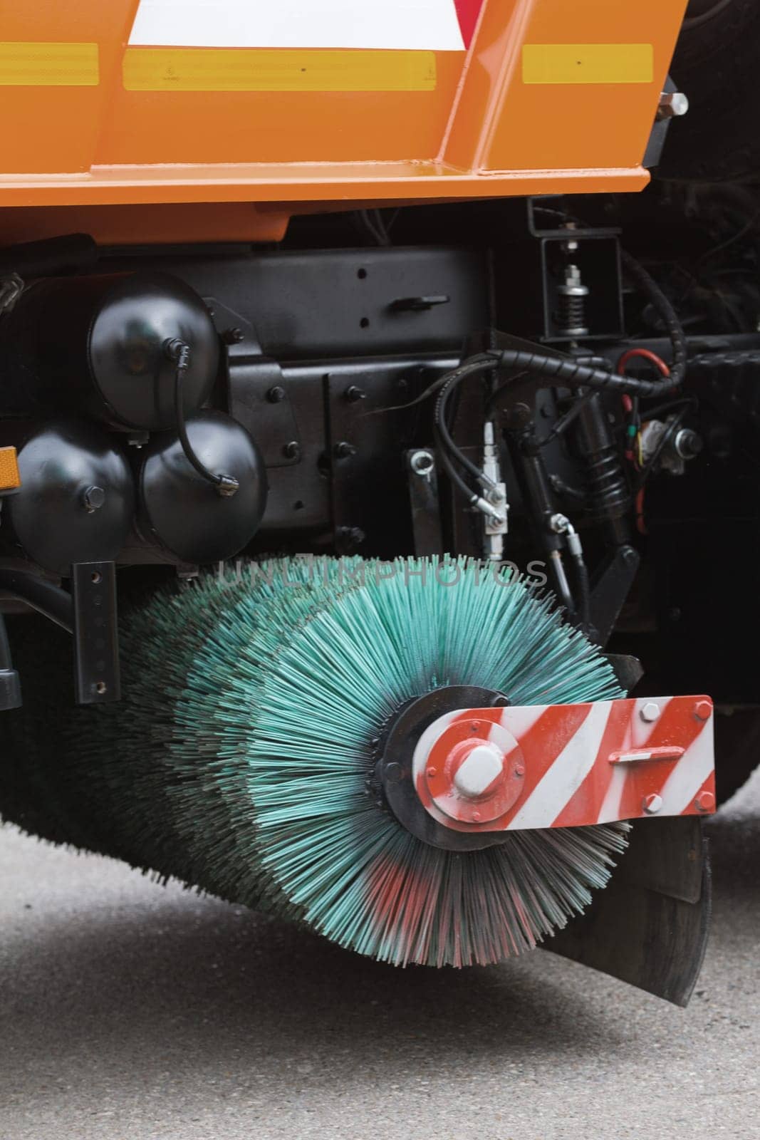 Brushs of street cleaning machine - close up, vertical