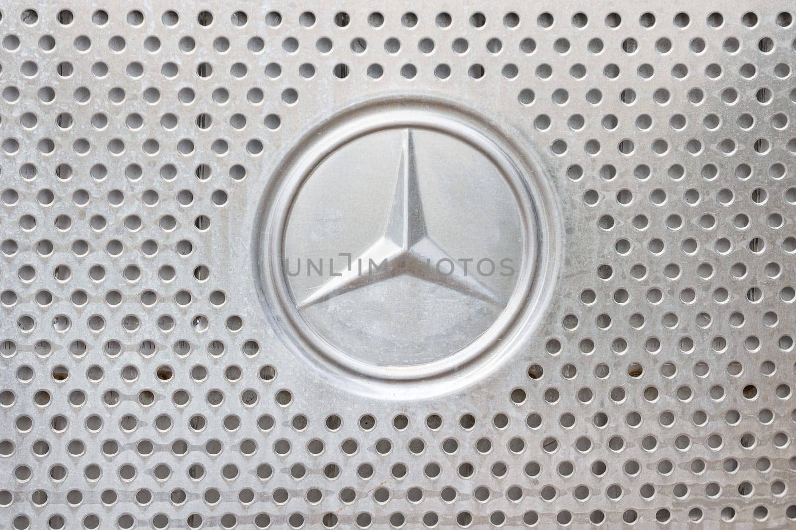 Kazan, Russia - October 28, 2017: Mercedes Benz logo on hood of construction truck, close up