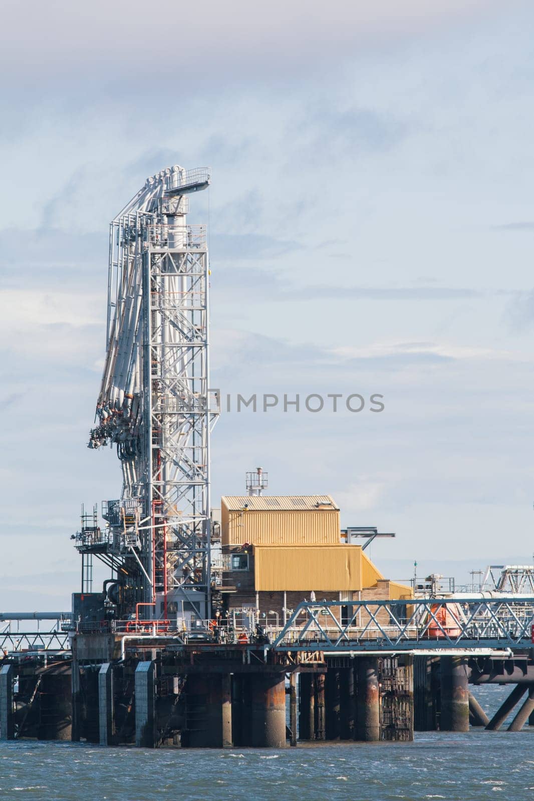Oil installation at sea - platform for production oil and gas - telephoto shot