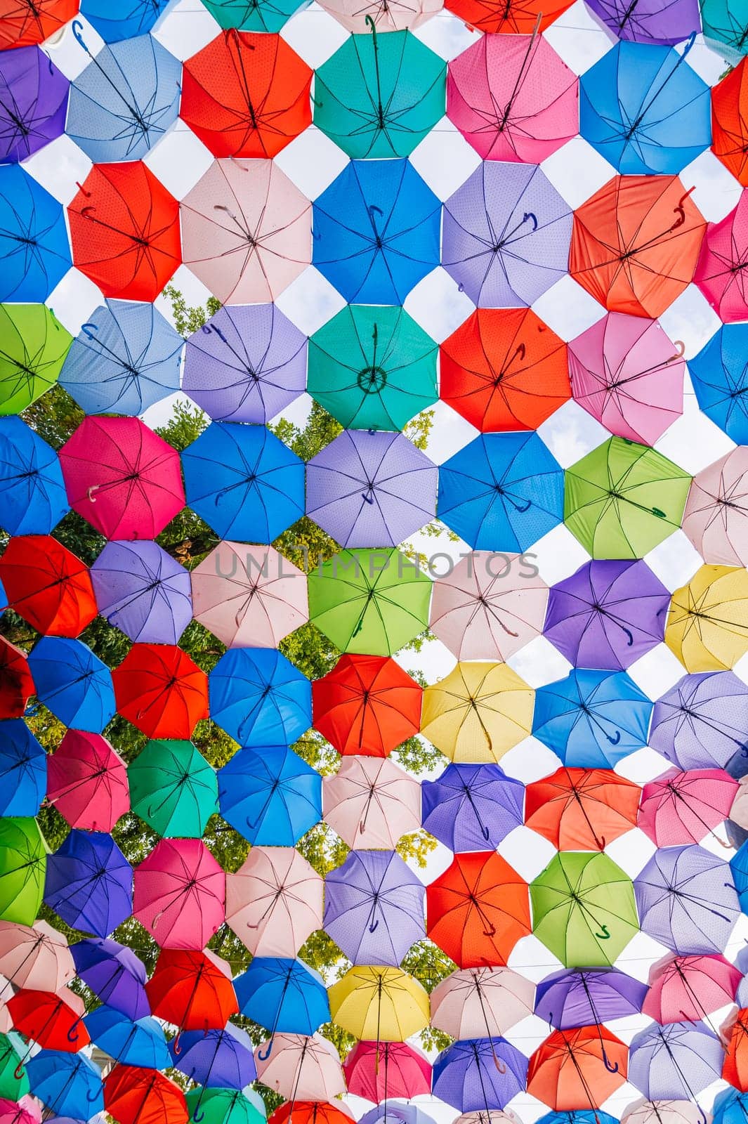 multicolored bright colorful umbrellas decoration on festive rainbow street in Tashkent in Uzbekistan