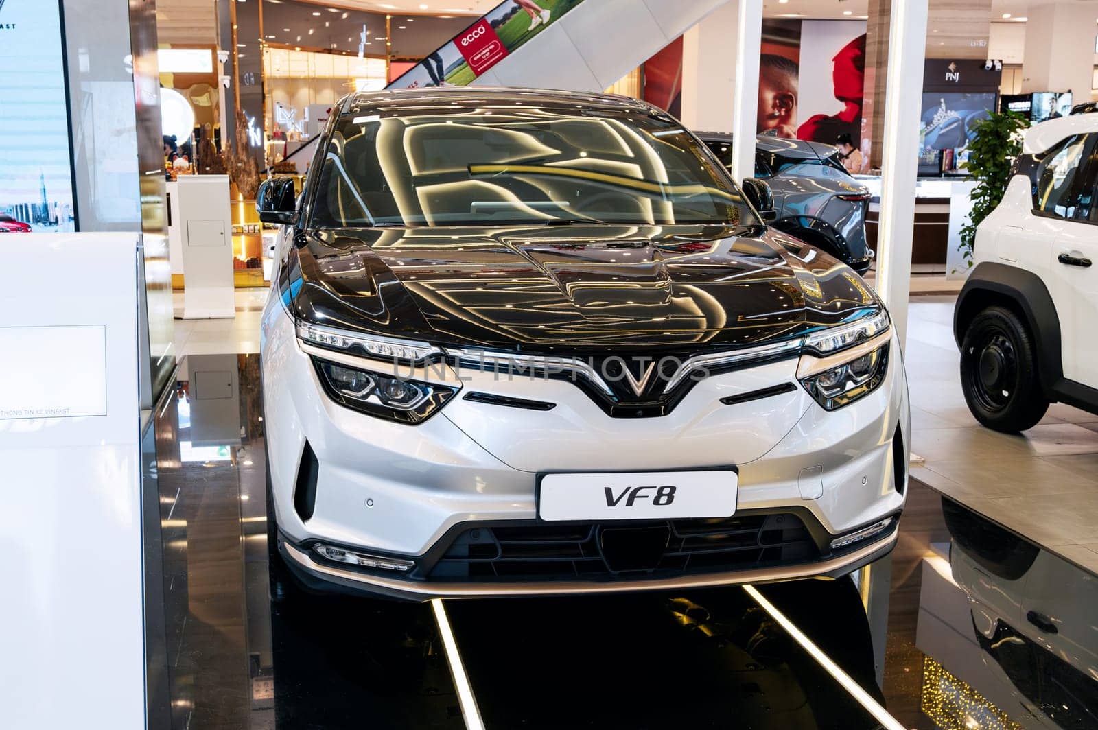 New modern Vietnamese electric car Vinfast VF8 at the automobile exhibition Vingroup in Vietnam
