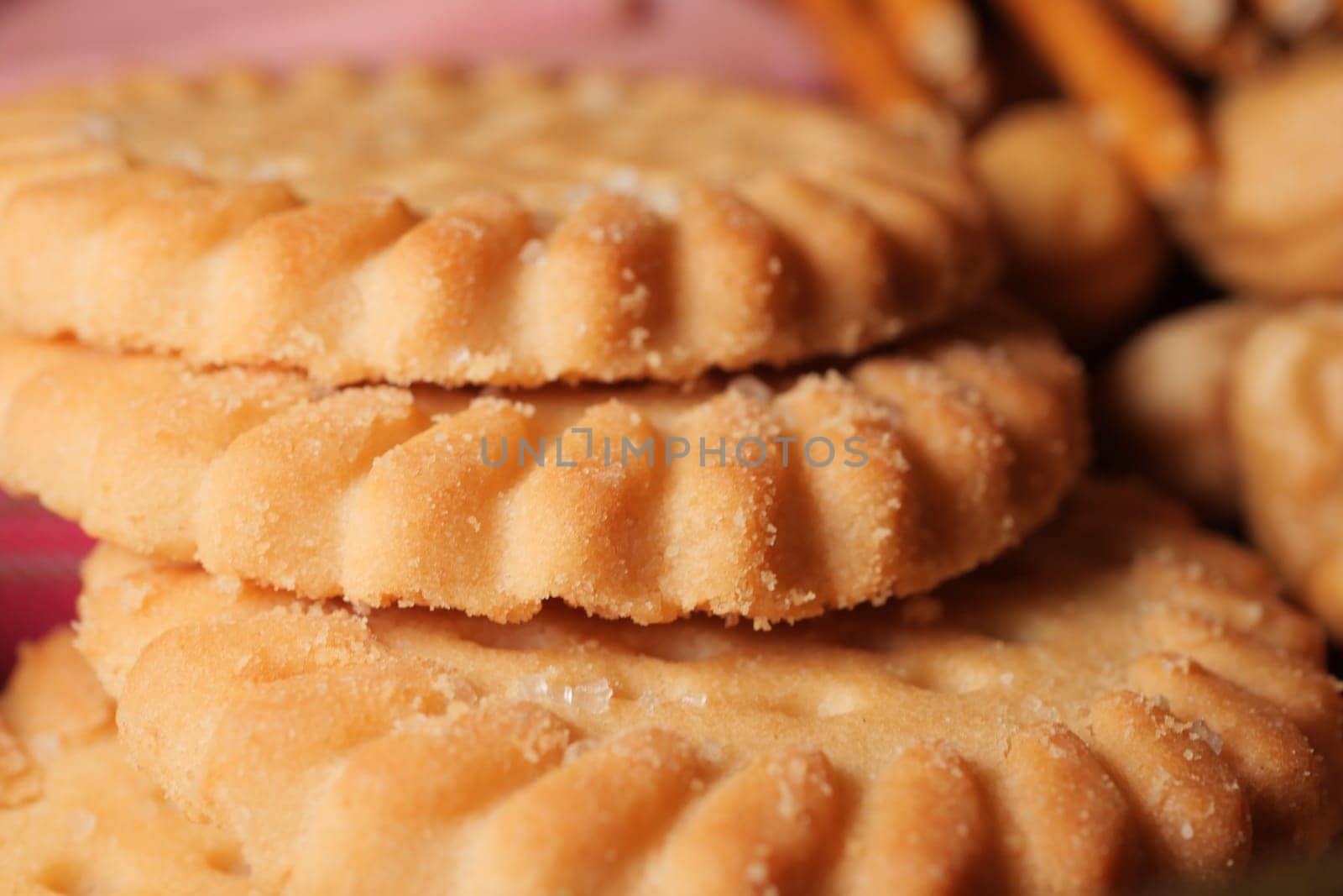 Golden cookies are neatly arranged, perfect for a delightful treat.