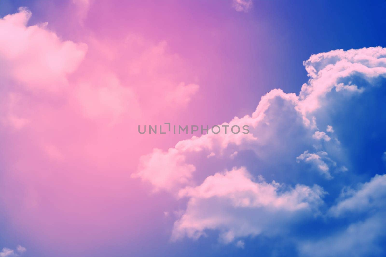 blue sky and soft clouds processed with a color filter. abstract nature background