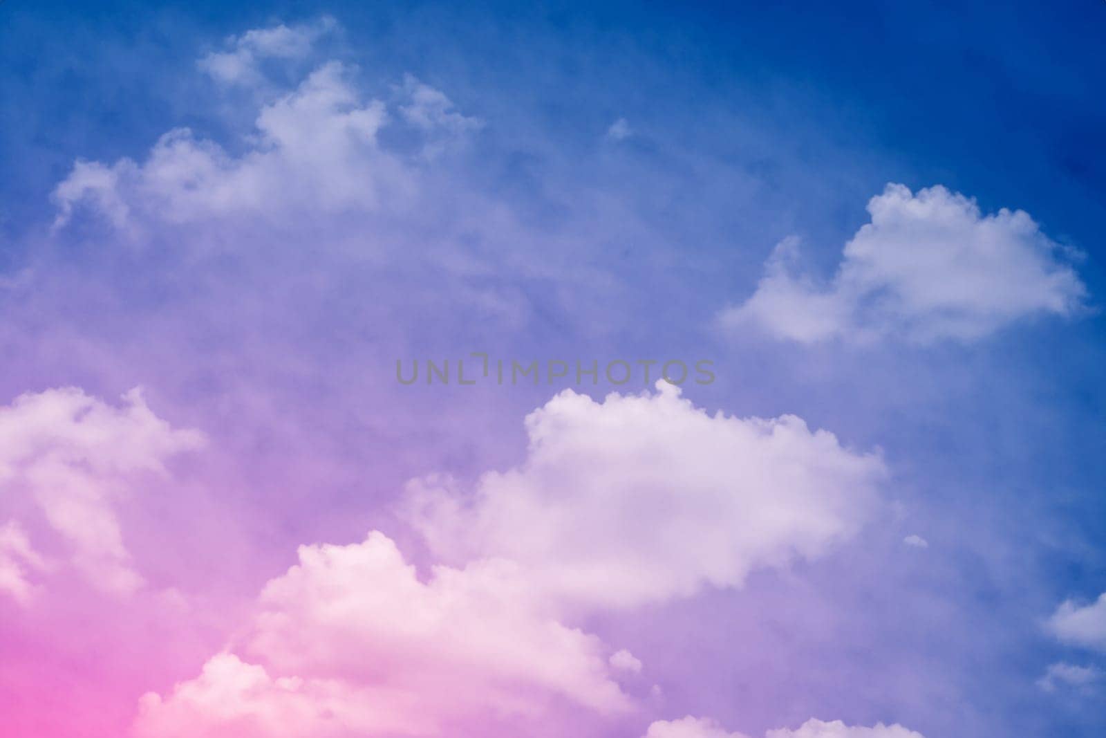 blue sky and soft clouds processed with a color filter. abstract nature background
