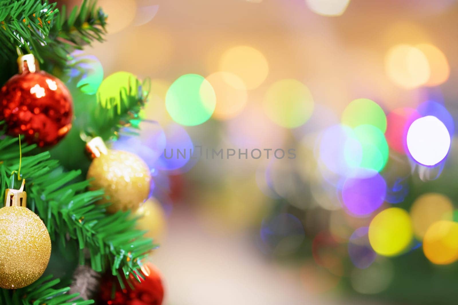 decorated christmas tree on blurred background. christmas background
