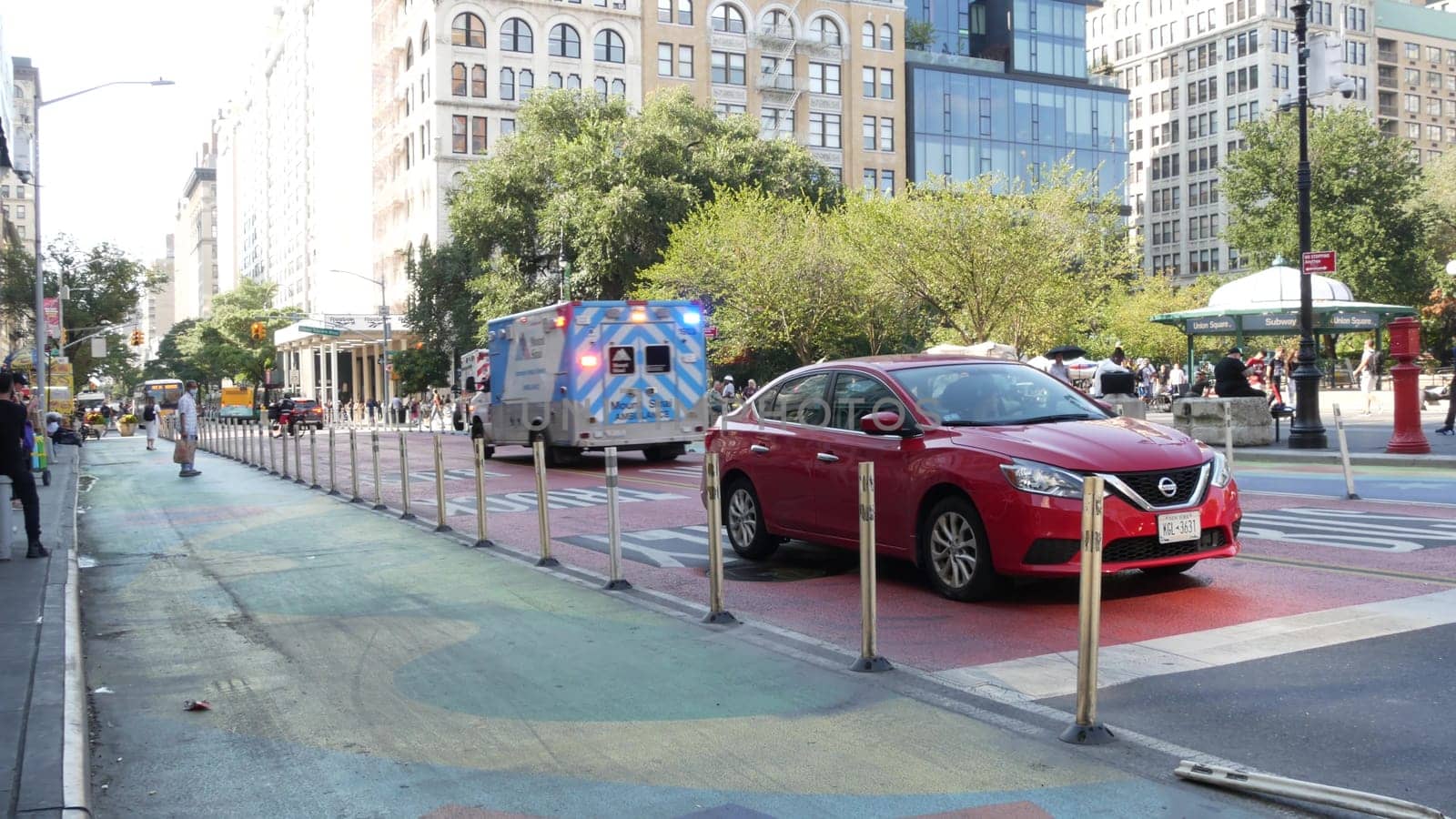 New York City, United States - 6 Sept 2023: NYFD Ambulance medical emergency, american fire department paramedic truck, Manhattan Union Square. USA 911 vehicle on street. NYC first responders. People.