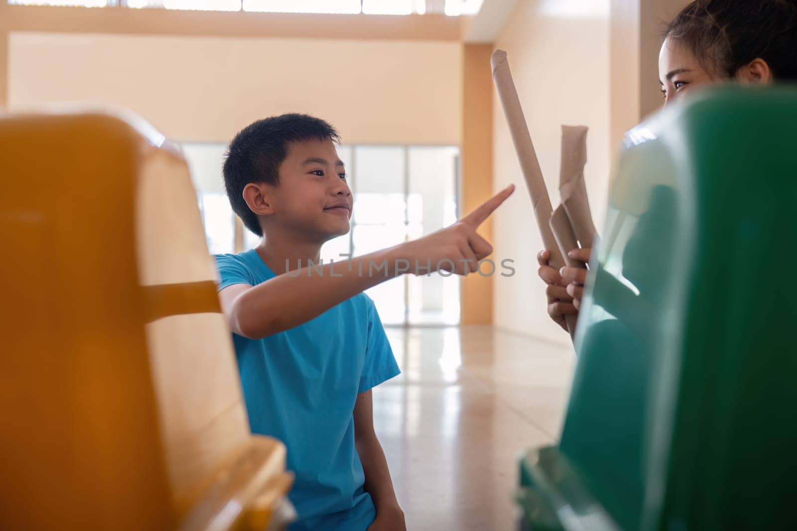 Two individuals share insights and practices surrounding waste separation and recycling, empowering environmental stewardship in their community.