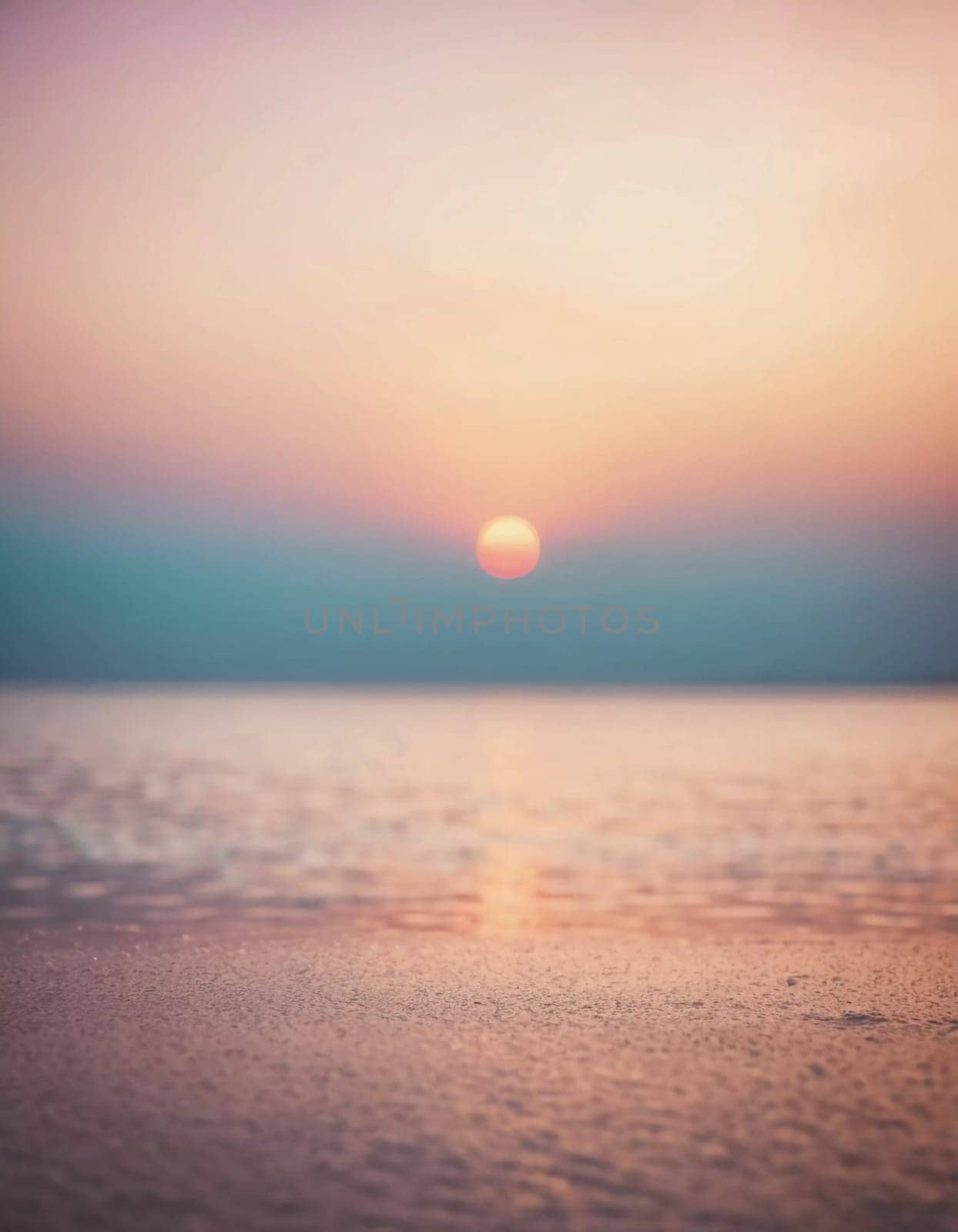 A breathtaking sunset unfolds as pastel colors merge in the sky, casting a serene glow over the still waters of the sea. The tranquility invites calm contemplation and awe.