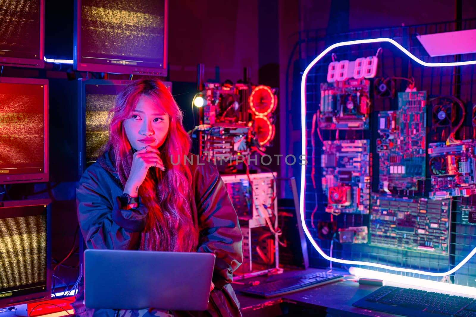 Asian woman is sitting at a desk with a laptop service in server room, Thinking and solve problems, Software engineer typing coding in laptop computer at data center, Cyber security