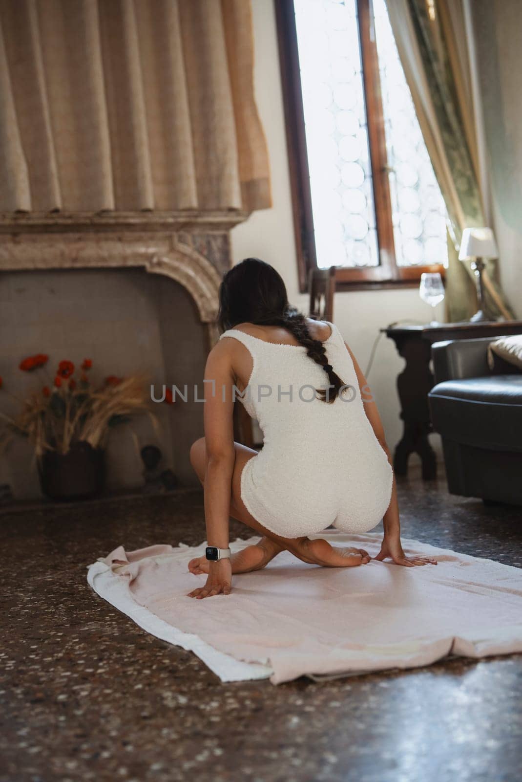 A tranquil and serene moment dedicated to meditation on a soft mat in a warm, inviting, and cozy space atmosphere
