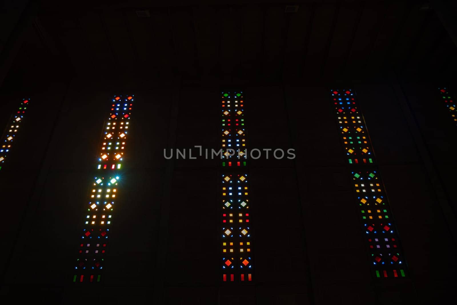 Le Havre, France, February 26 2025: Interior of St. Joseph s Church in Le Havre, showcasing Auguste Perret s modernist design with vibrant stained glass
