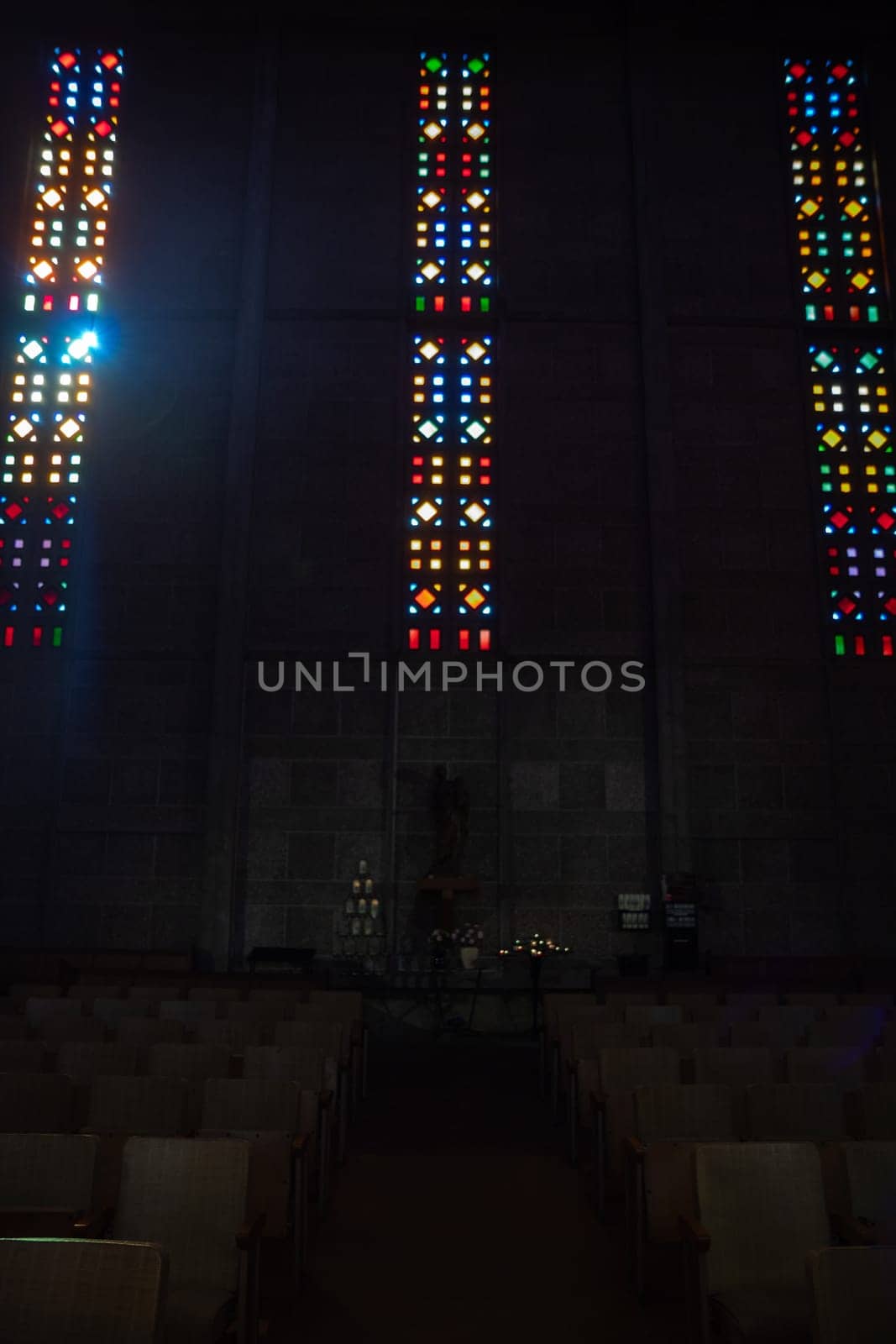 Le Havre, France, February 26 2025: Interior of St. Joseph s Church in Le Havre, showcasing Auguste Perret s modernist design with vibrant stained glass