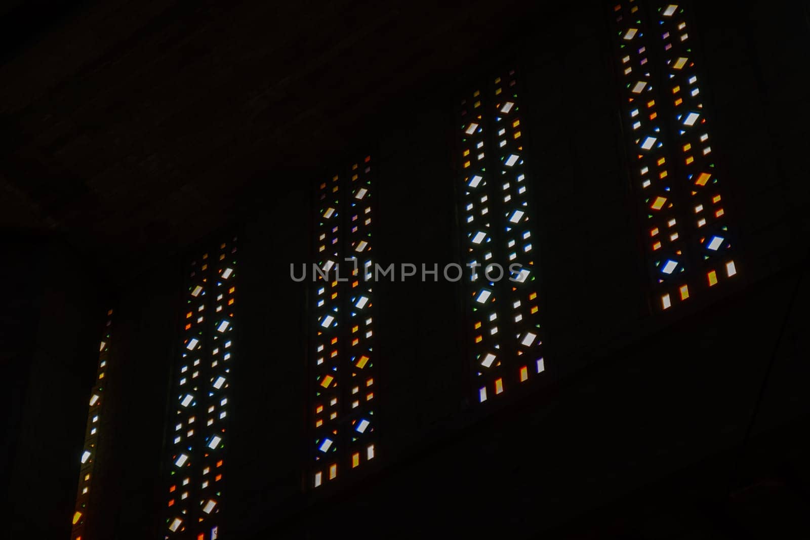 Le Havre, France, February 26 2025: Interior of St. Joseph s Church in Le Havre, showcasing Auguste Perret s modernist design with vibrant stained glass