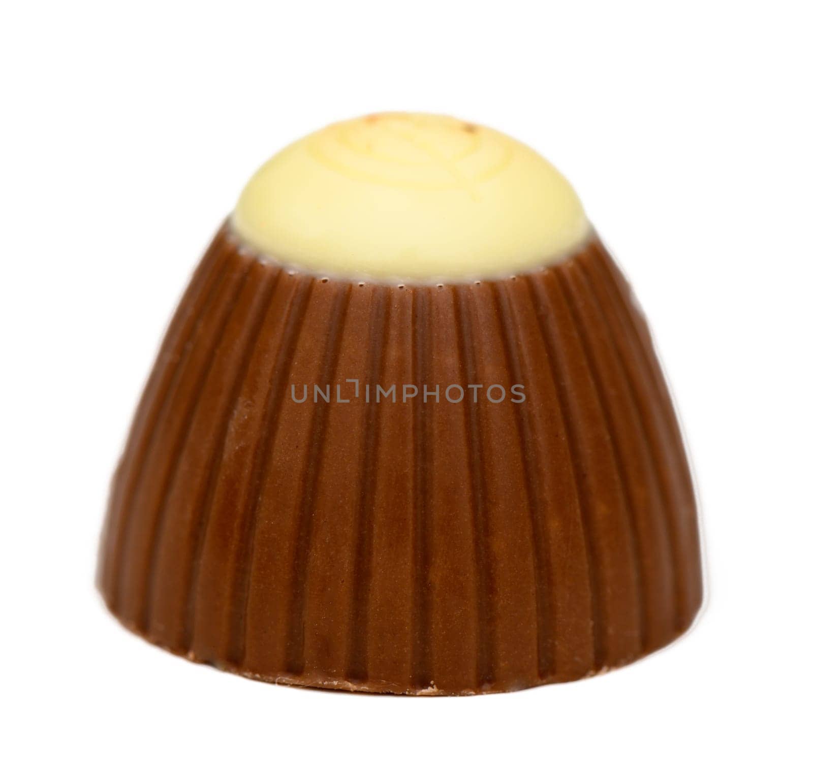 A beautifully crafted chocolate treat features a smooth white top nestled atop a textured dark brown shell, perfect for satisfying any sweet tooth and elevating treats.