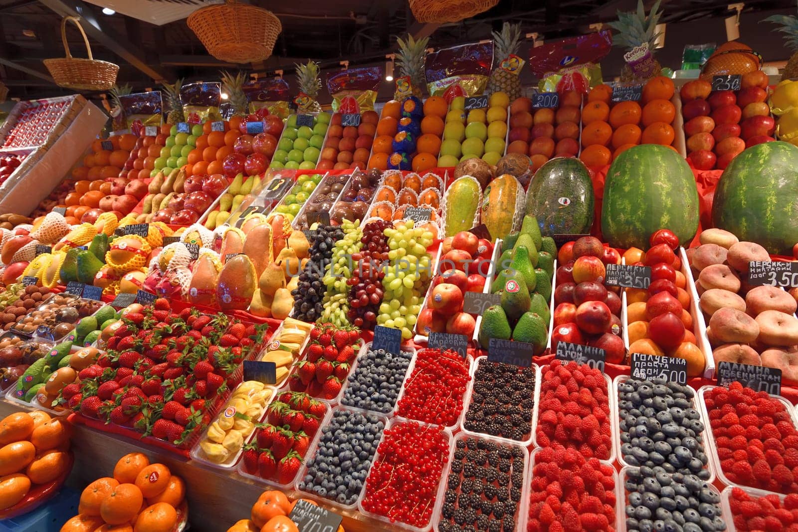 Moscow, Russia - Apr 02.2022. Depo - largest food mall in Europe. Showcase with fruits and a berries