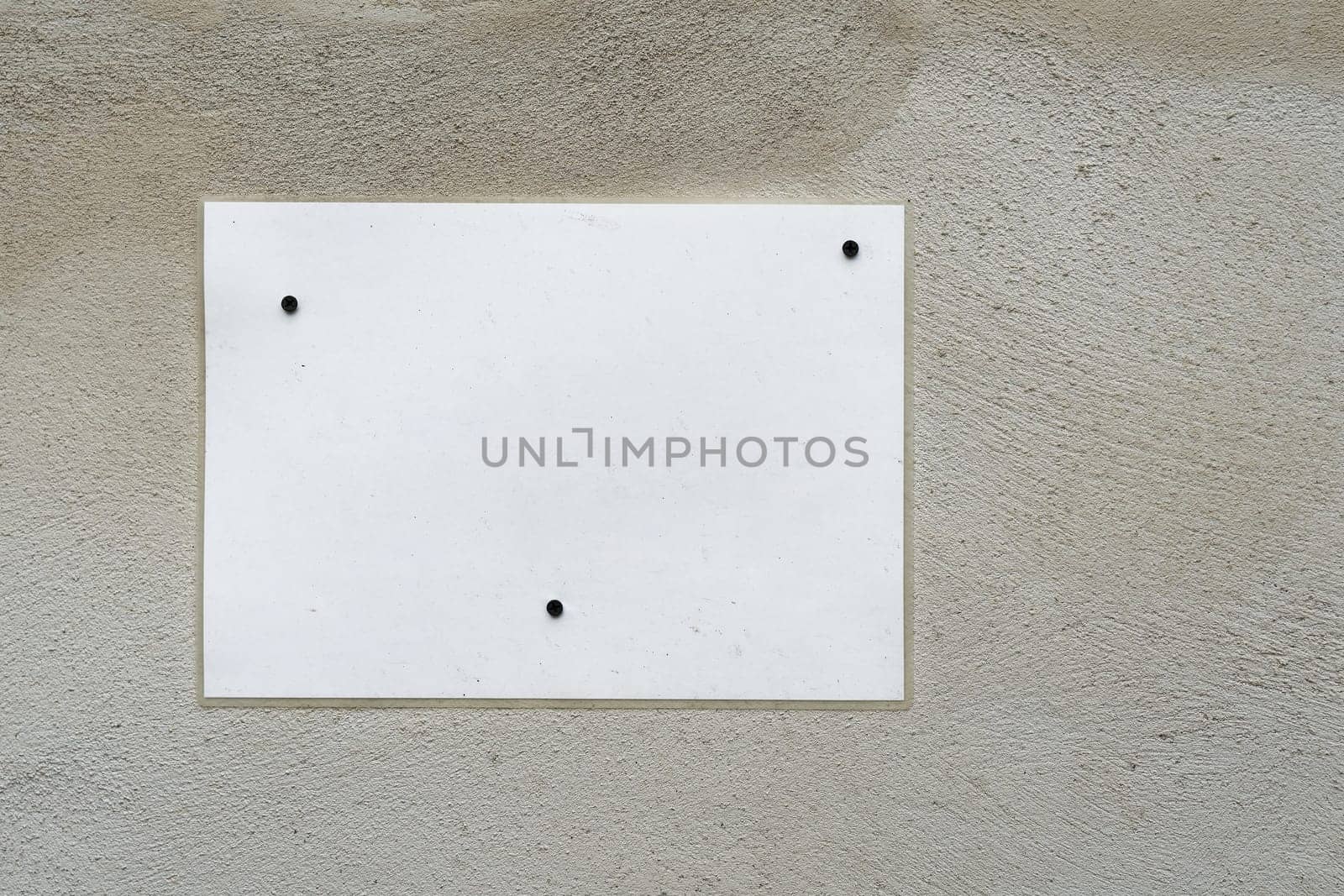 Blank white unmarked sign with text space, Textfreiraum as a notice on a house wall