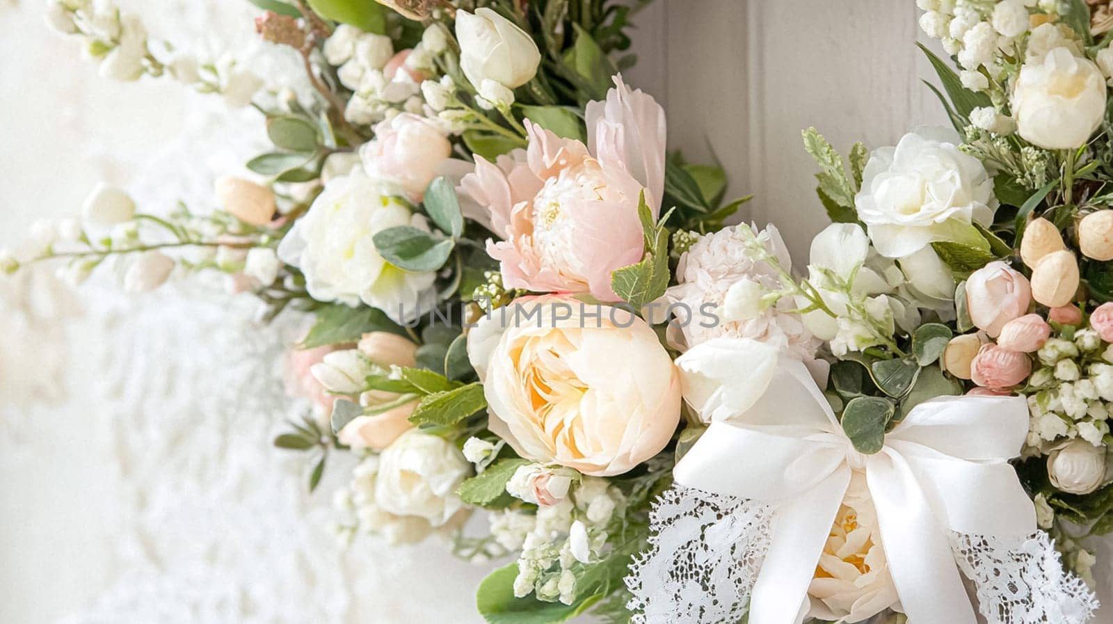 Charming English Easter decor with pastel florals, painted eggs, bunnies, and spring touches throughout a countryside cottage