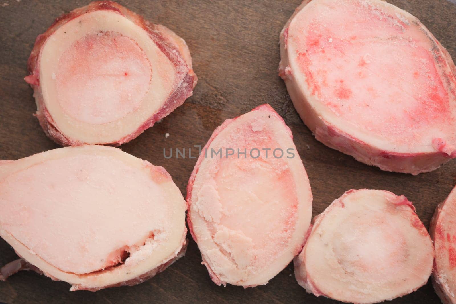Chopped bone marrow pieces ready for a culinary demonstration.