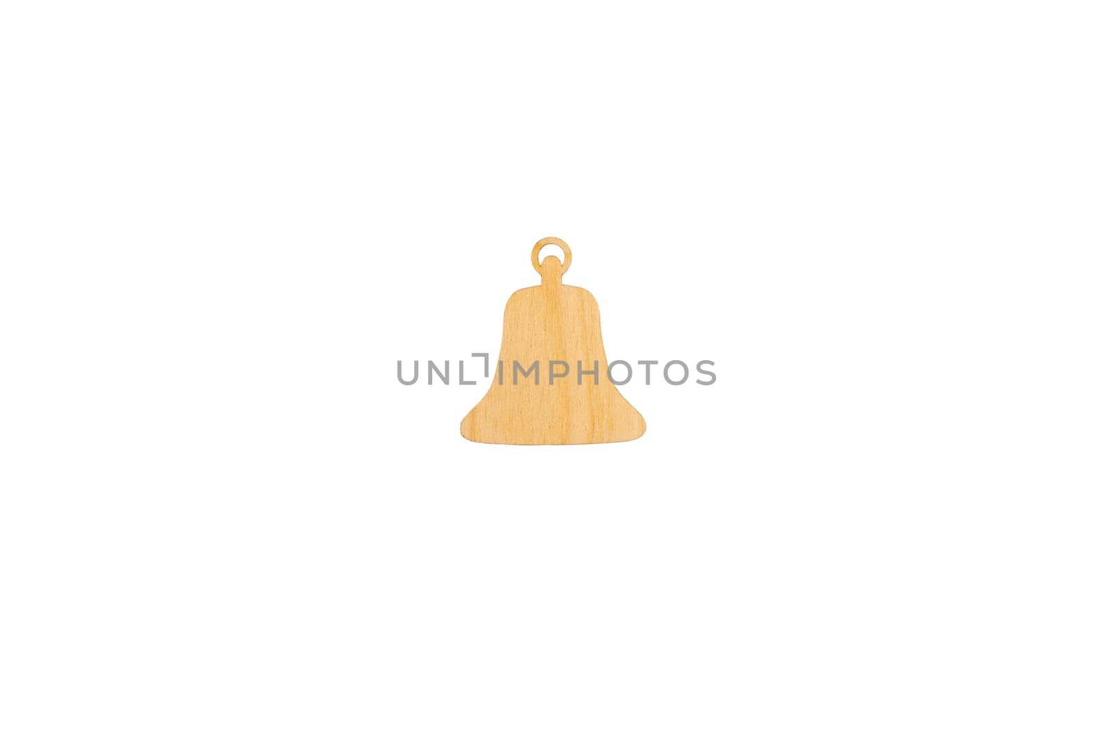 Wooden flat blank in the form of a bell figure on a white isolated background. Flat lay, top view