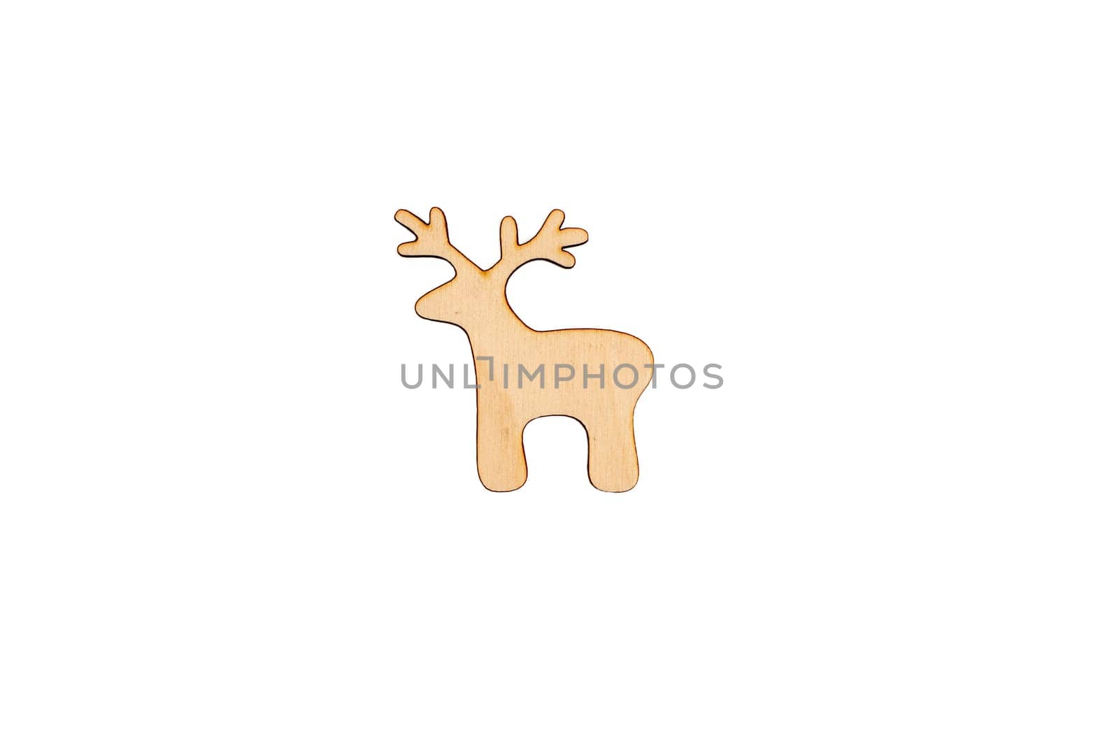 Wooden flat blank in the form of a deer figure on a white isolated background. Flat lay, top view