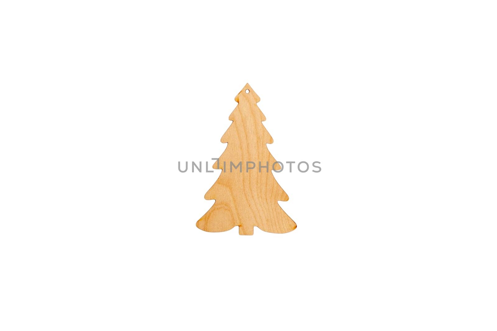Wooden flat blank in the form of a spruce figure on a white isolated background. Flat lay, top view, mock up