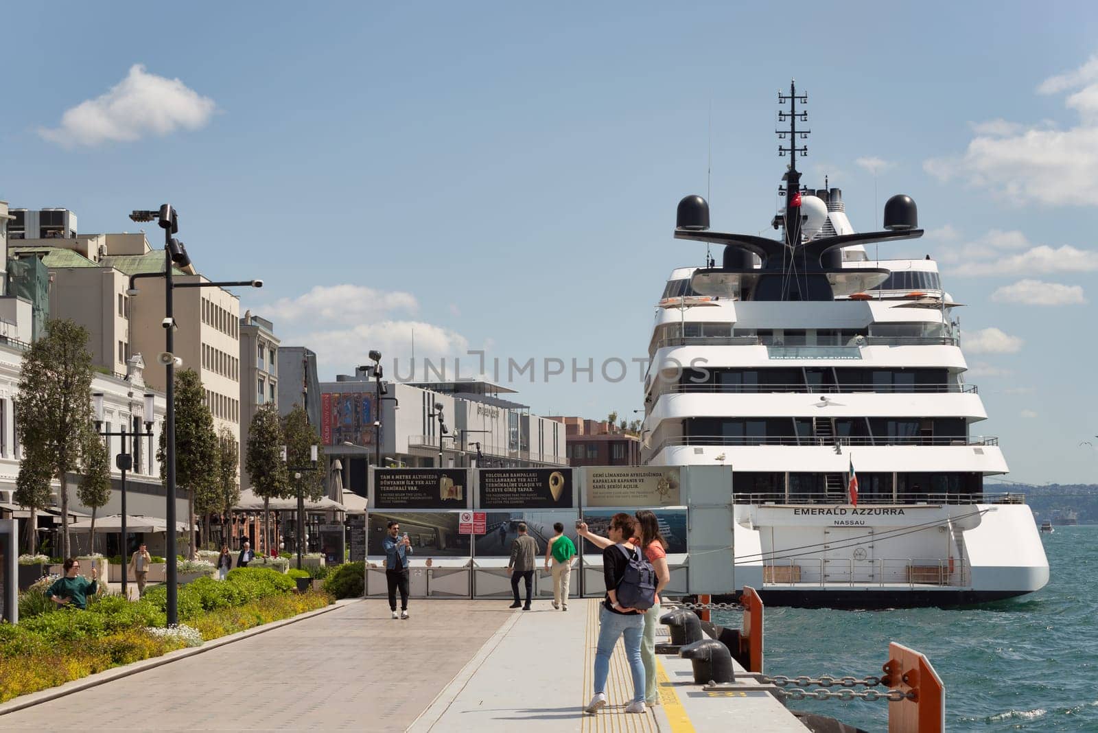 Istanbul, Turkey - May 13, 2023: EMERALD AZZURRA, Cruise ship docked at terminal of Galataport, a mixed use development located along shore of Bosphorus strait, in Karakoy neighbourhood