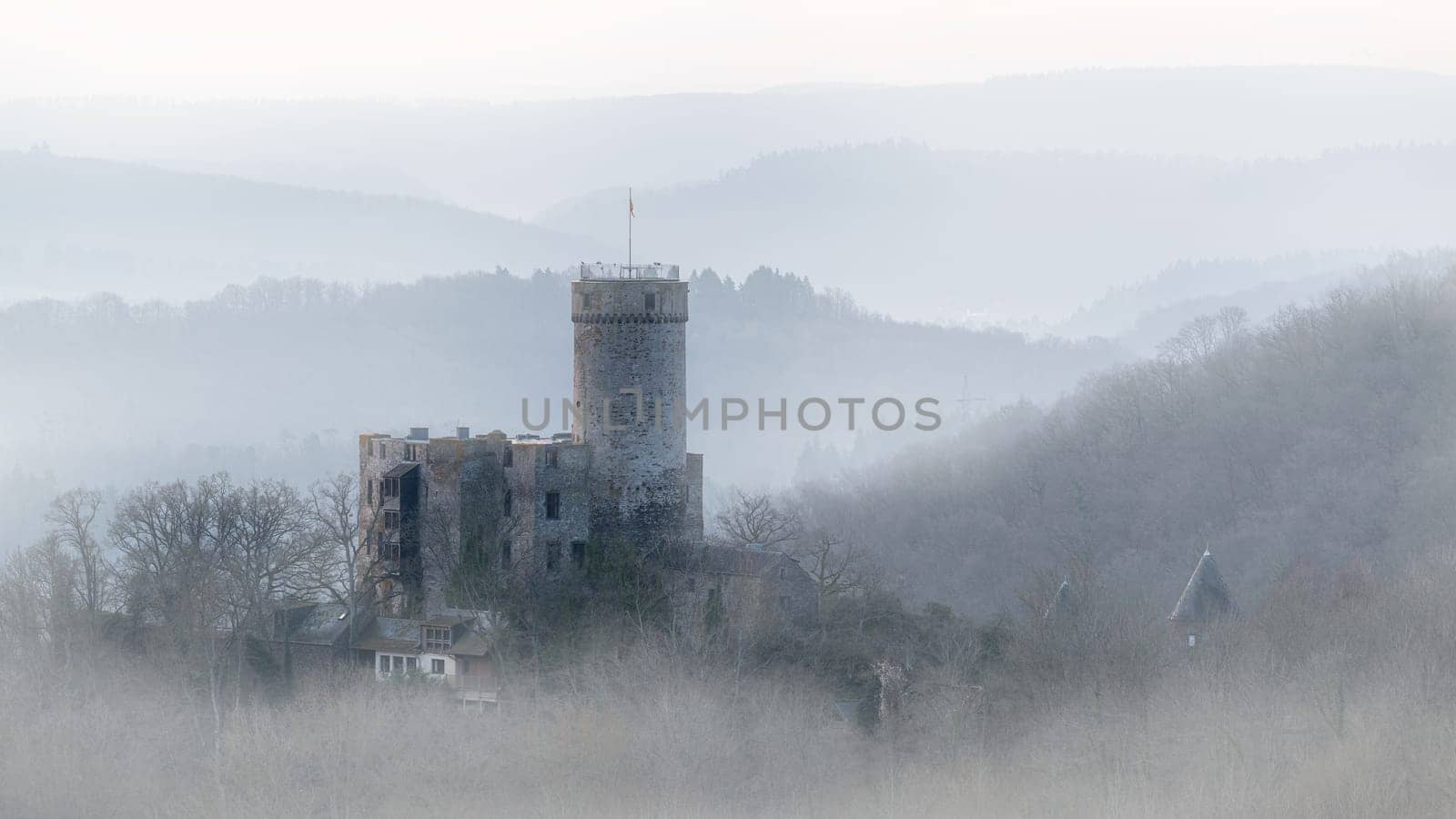 Roes, Germany - March 9, 2024: Panoramic image of Pyrmont castle during sunrise on March 9, 2024 in Eifel, Germany
