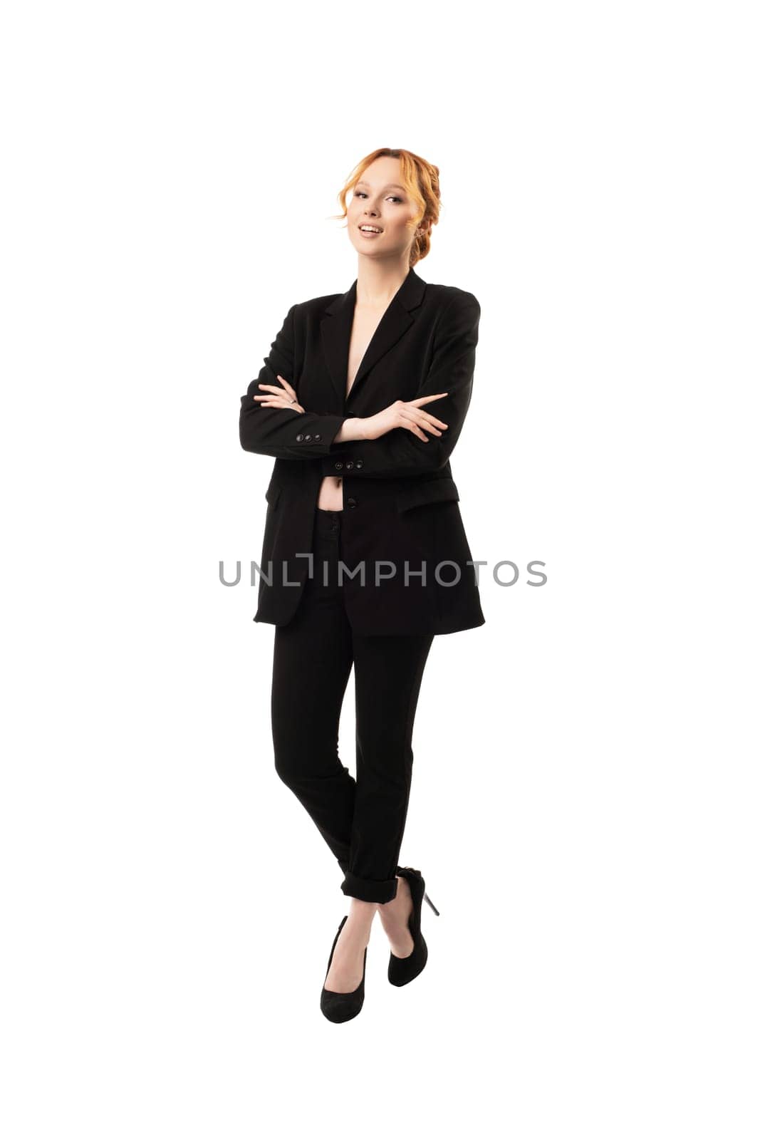 portrait of a sexy redhead businesswoman posing without lingerie isolated