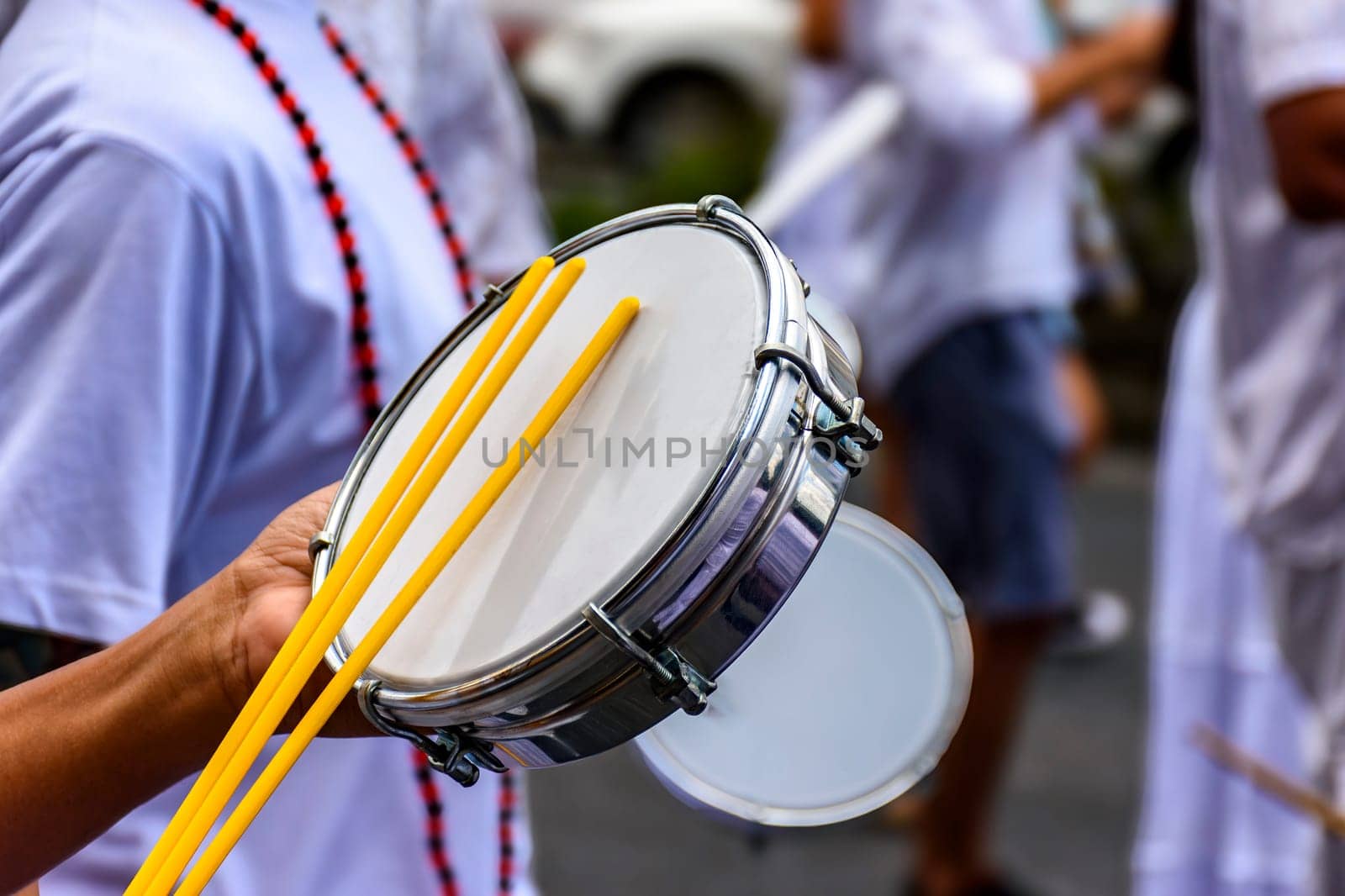 Tambourine player on the streets of Brazil during Carnival