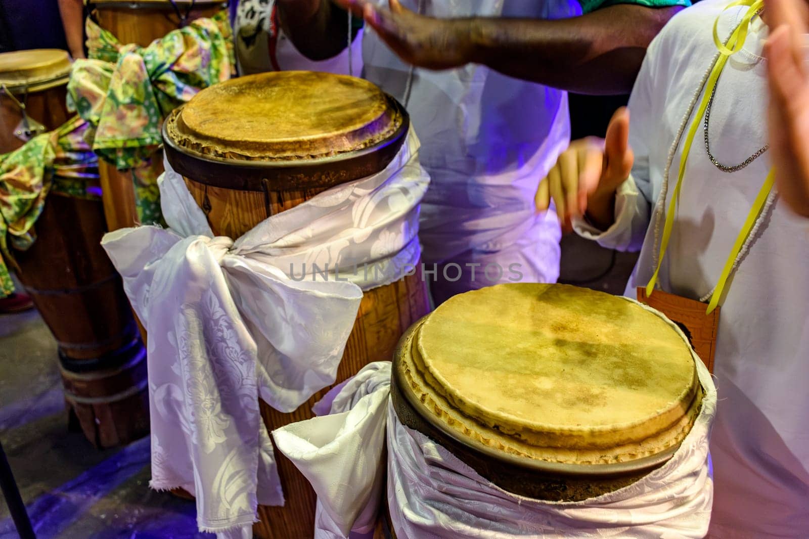Decorated drums in a nighttime Umbanda religious ceremony