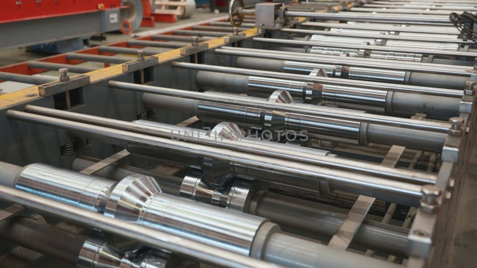 Steel roofing forming machine for manufacturing metal pipes and tubes in the factory, Industrial machine for metel sheet roof coils cut