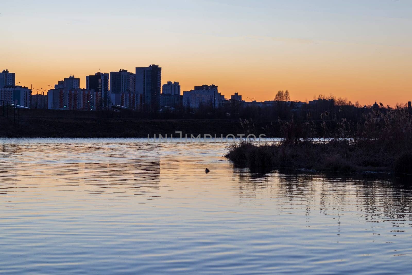 Sun set over a large water reservoir