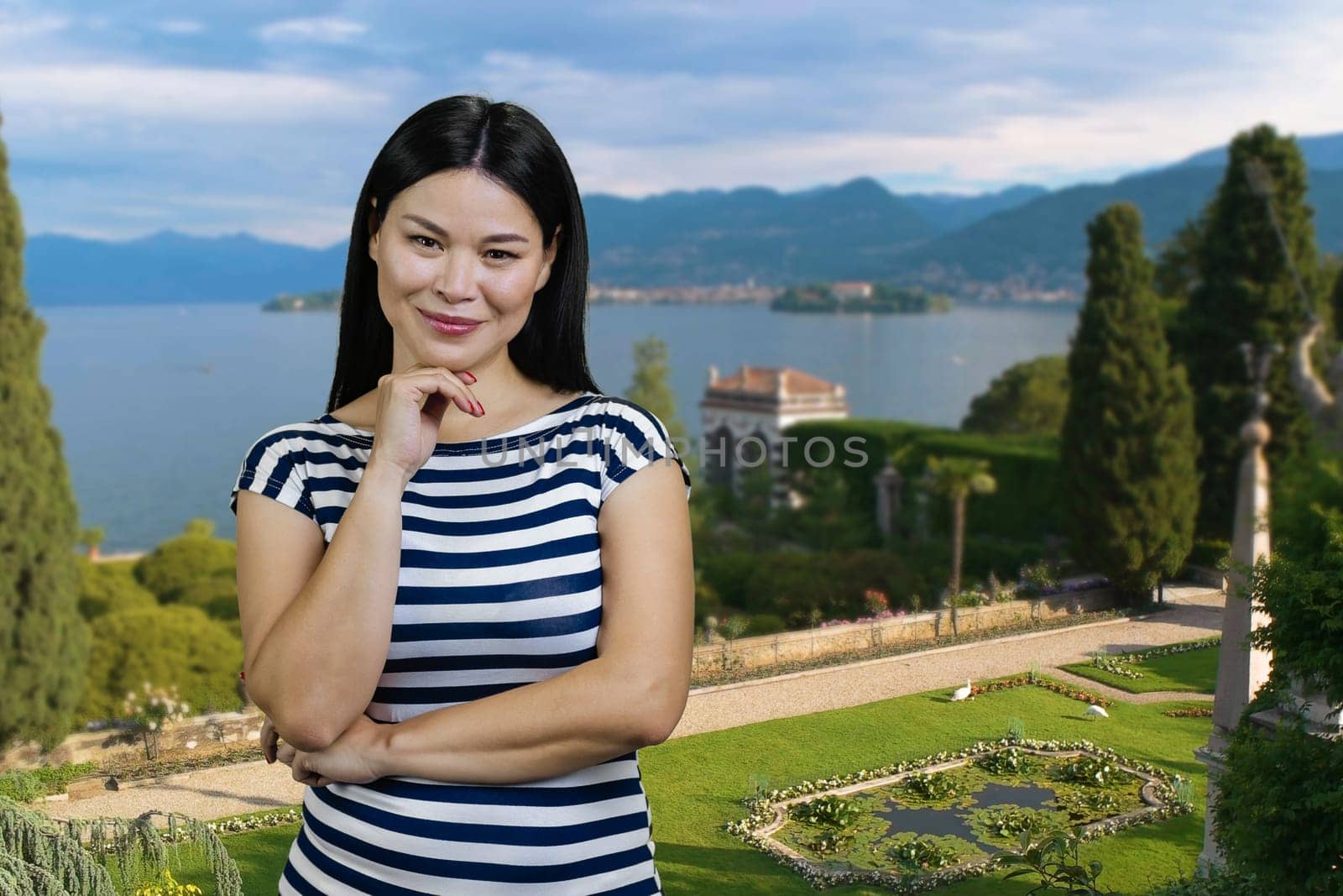 Portrait of asian woman against resort landscape background. Sea vacation background.