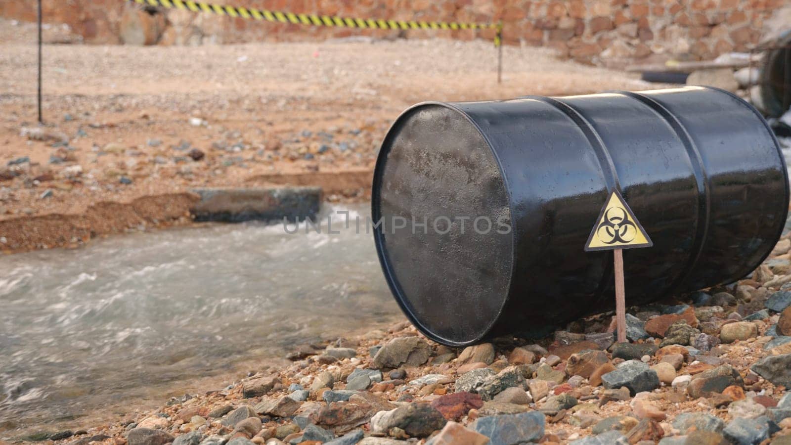Close up of industry oil fuel tank spilling water pollution, Conserve water and Environment Issue, biohazard caution of collects sample of waste from industrial