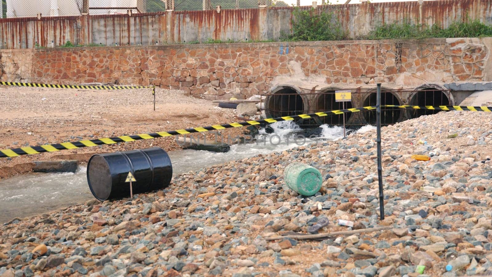 Close up of industry oil fuel tank spilling water pollution, Conserve water and Environment Issue, biohazard caution of collects sample of waste from industrial
