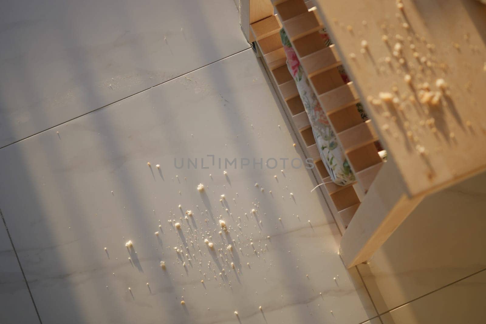 Crafting materials spread across the floor after a woodworking project.