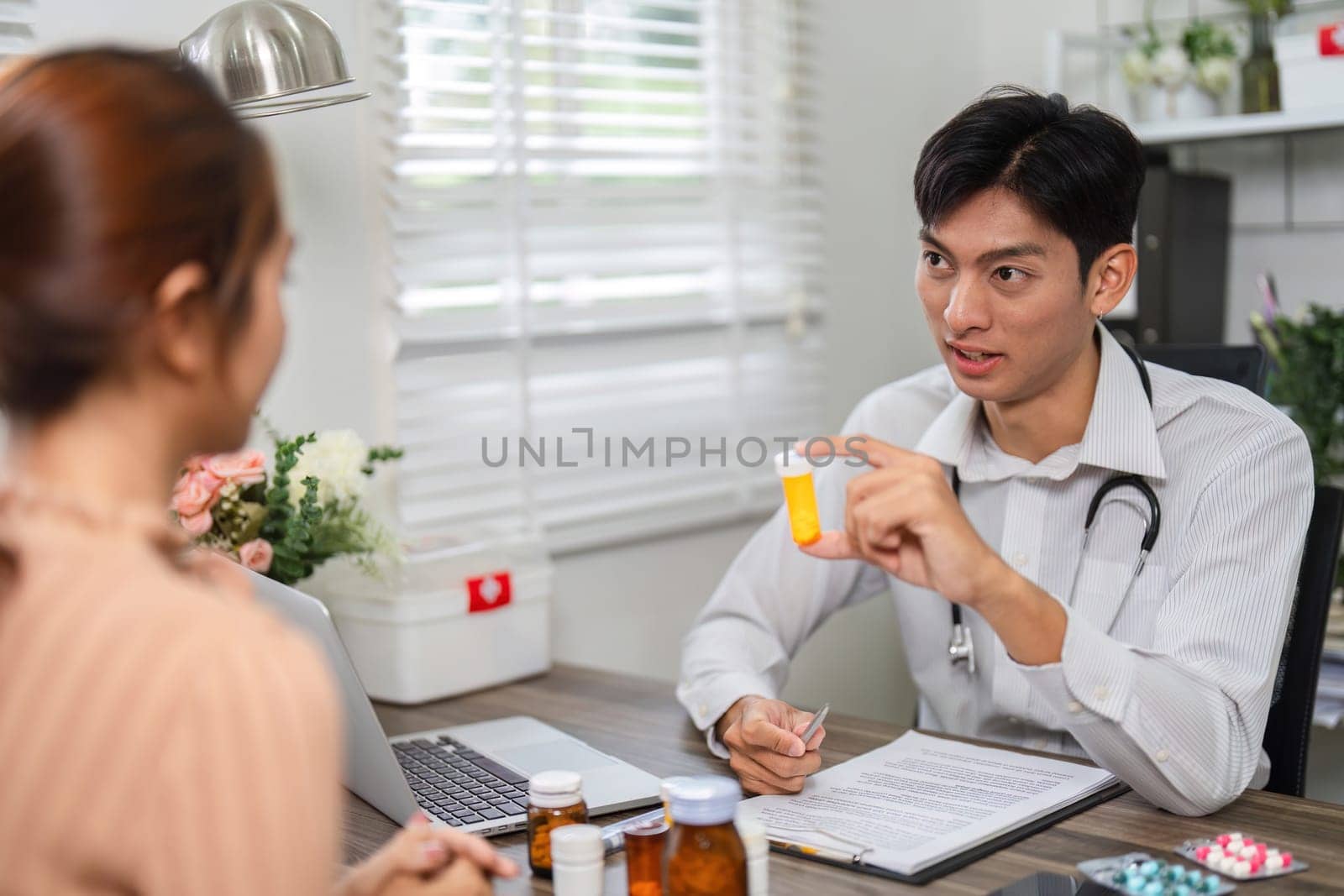 During a one-on-one consultation, the healthcare provider explains the importance of each medication, fostering a sense of trust and understanding.