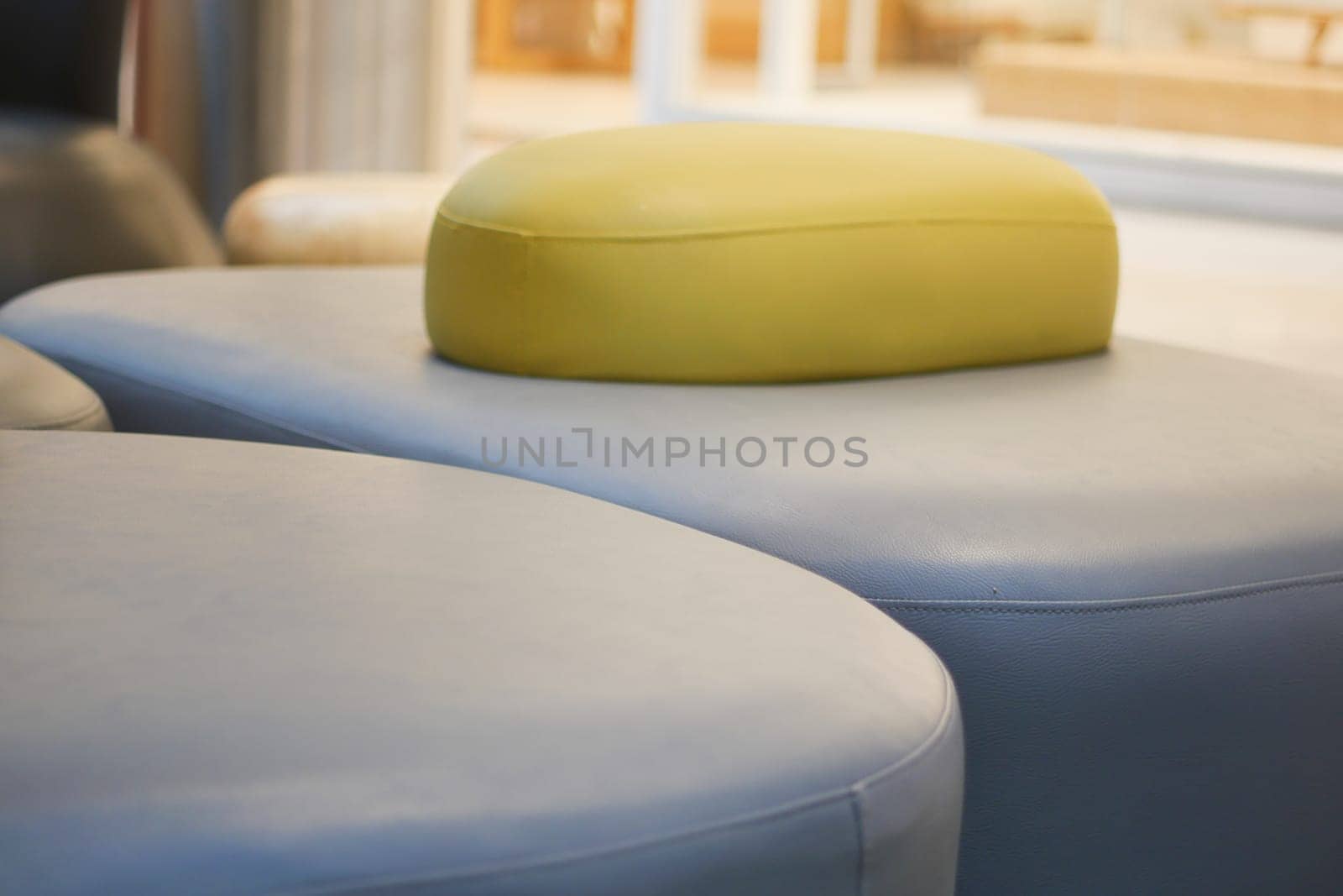 Stylish seating design with modern shapes and vibrant cushions displayed.