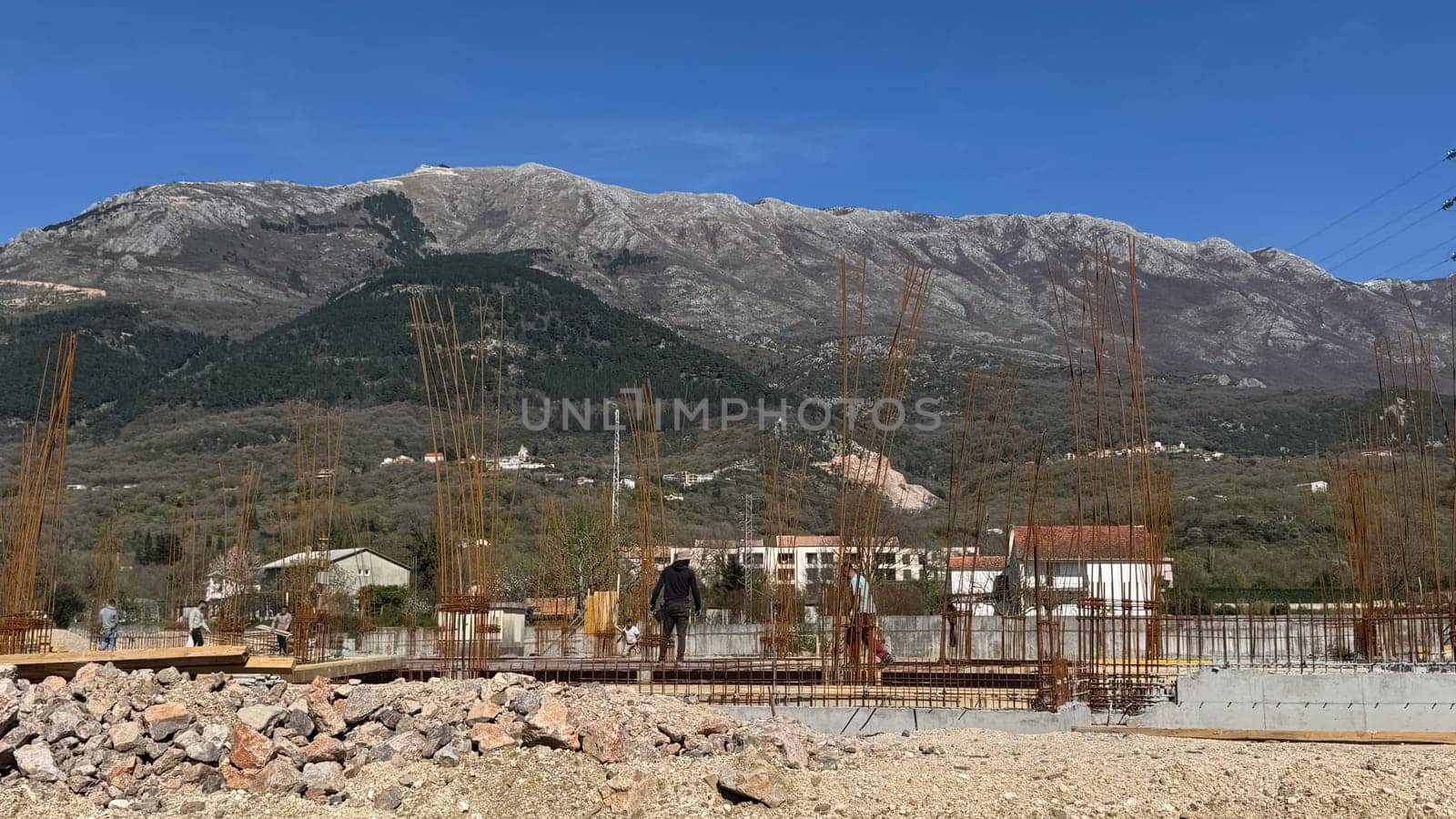 Budva,Montenegro - April 10,2025:Construction of a house near the road Budva-Tivat. High quality photo