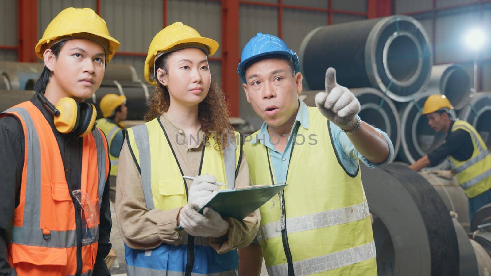 Manager leader training and assignmenting job for team of technicians worker skills quality at metal sheet factory, mechanical engineering team production, trainer industry factory worker