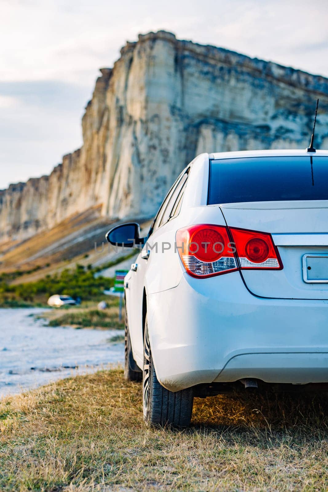hite car parked near White Rock mountain in Crimea.