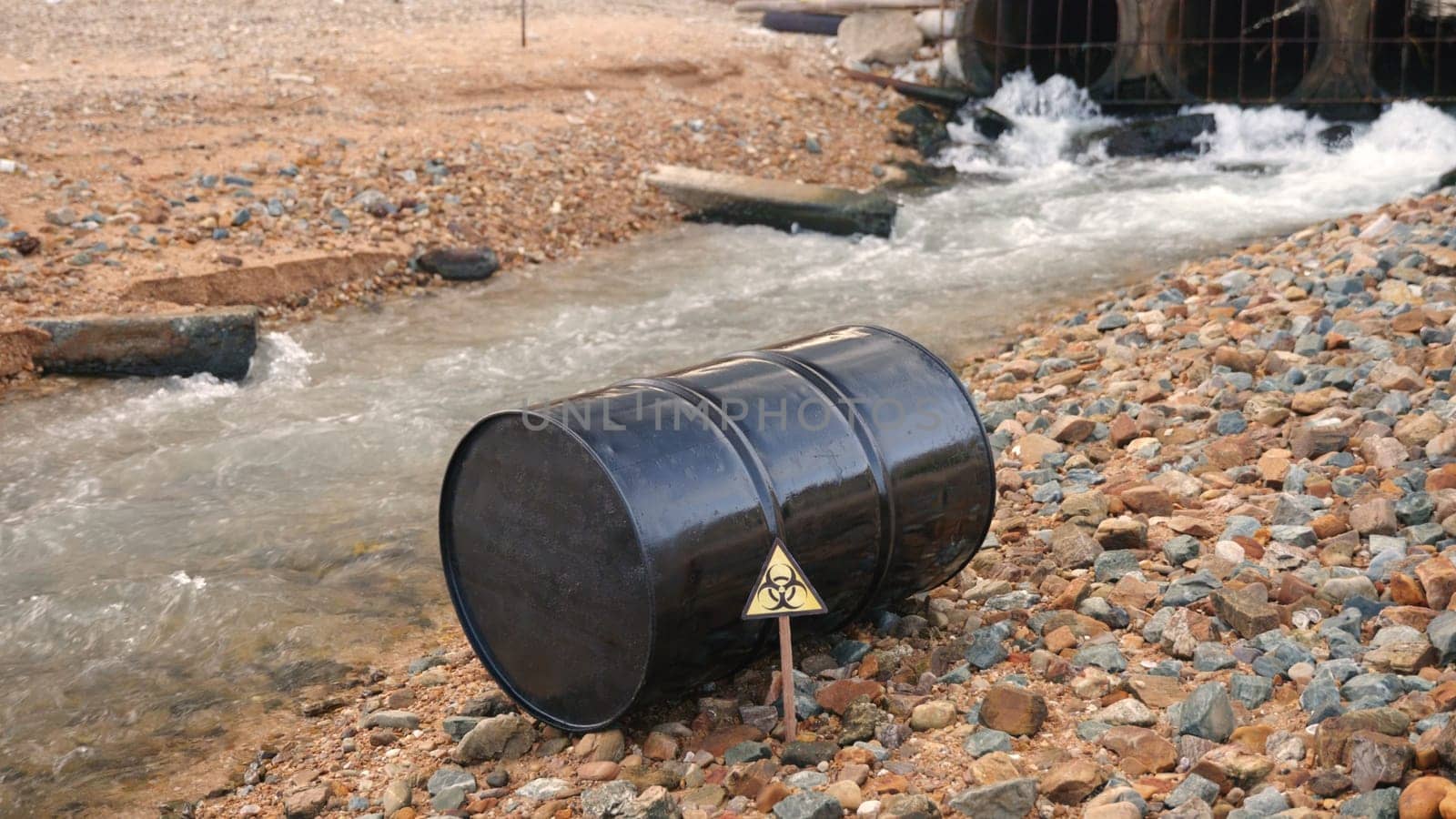 Close up of industry oil fuel tank spilling water pollution, Conserve water and Environment Issue, biohazard caution of collects sample of waste from industrial