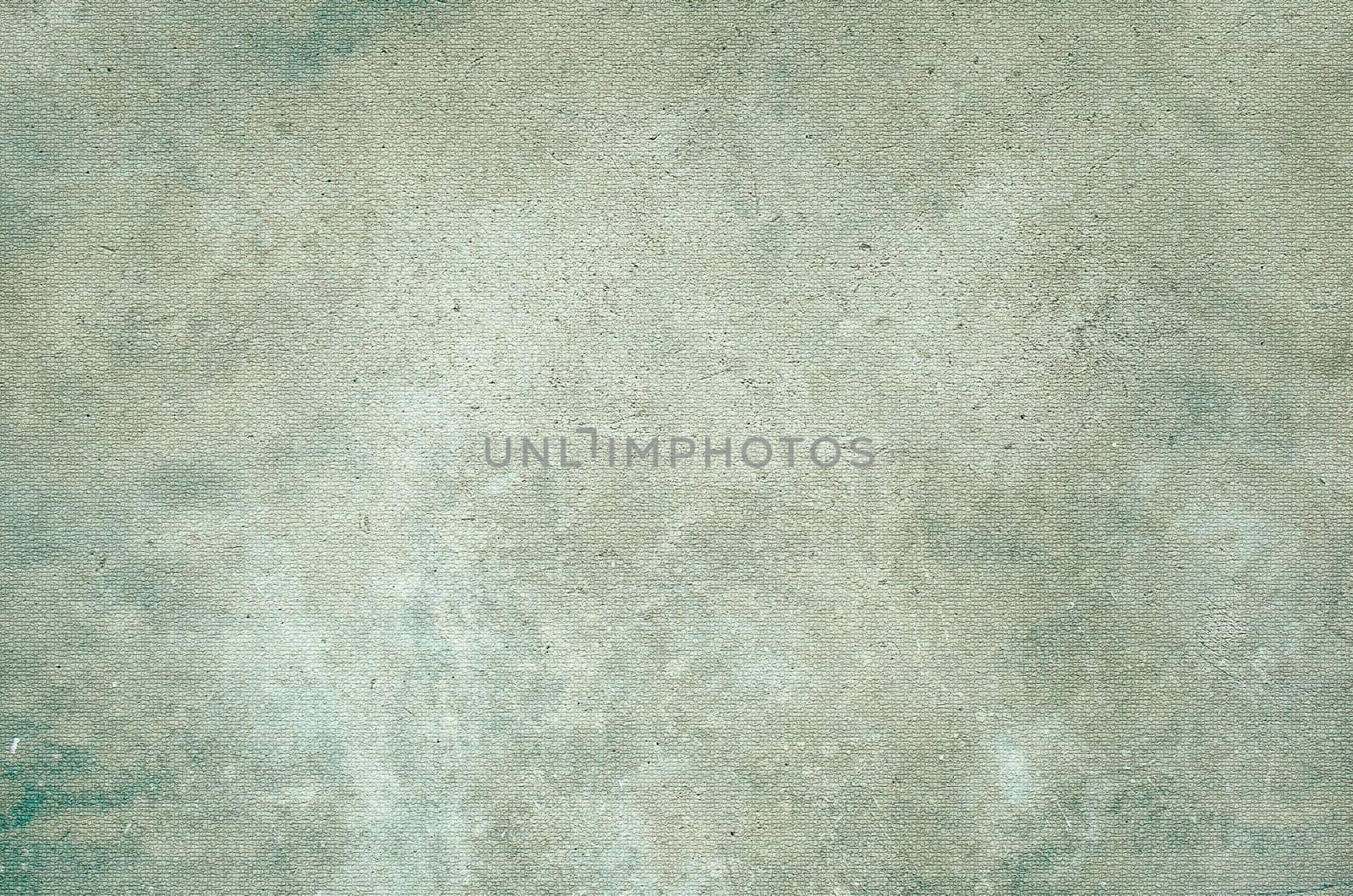Green concrete surface with a rough, textured pattern, ideal for backgrounds and design projects
