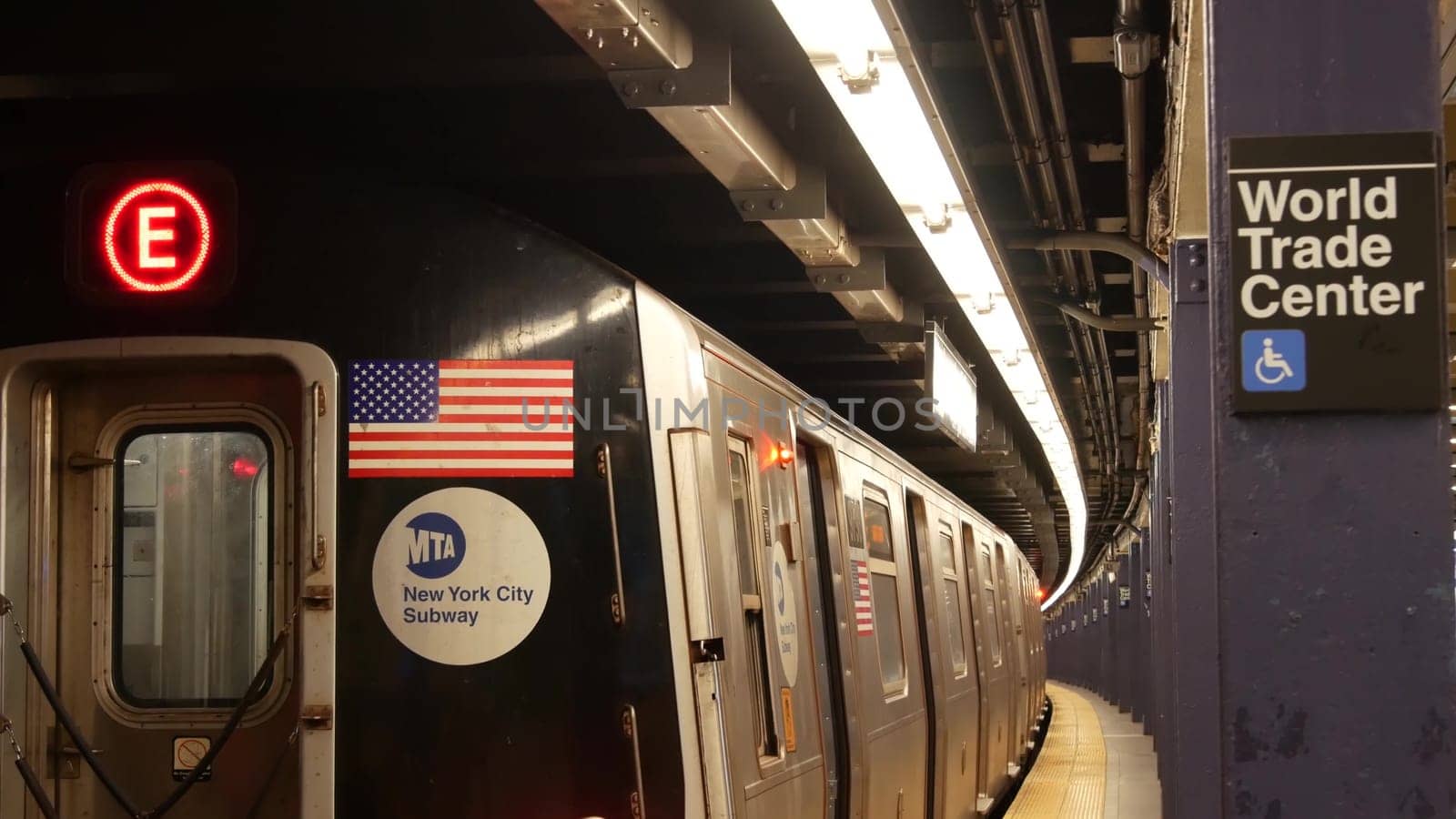 New York, United States - 10 Sept 2023: Subway station, underground metropolitan platform sign. Metro railway passenger public transport. Text signboard World Trade Center. Oculus, Manhattan downtown.